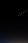 photo of shooting star during night time