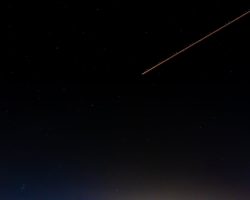 photo of shooting star during night time